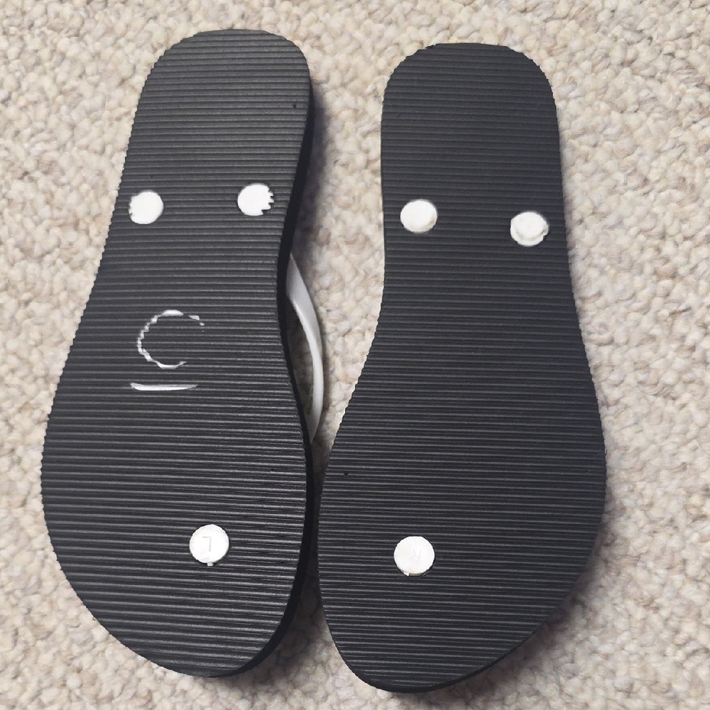 Karl Lagerfeld Black and White Flip Flop Sandals with Gold & Pink Accents - Picture 4 of 4